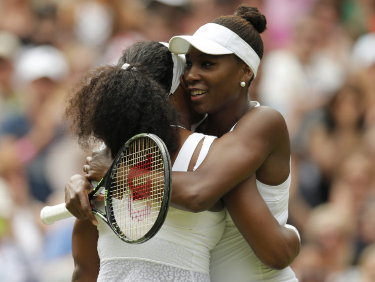 Tennis - Wimbledon - All England Lawn Tennis & Croquet Club, Wimbledon, England - 6/7/15 Women's Singles - USA's Serena Williams and USA's Venus Williams embrace after their fourth round match Action Images via Reuters / Andrew Couldridge Livepic EDITORIAL USE ONLY.